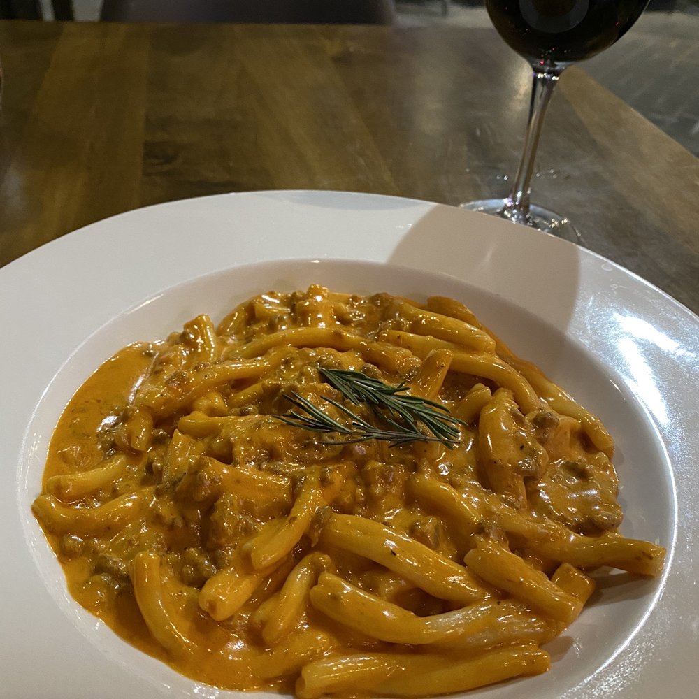 Pomo Pizzeria - Biltmore - Strozzapreti Salsiccia. Handcrafted piping hot pasta served with a rich meaty sauce. A dish this great would cost twice as much back in L.A. - Pizza Near Me - Phoenix, Arizona Pomo Pizzeria - Biltmore - Strozzapreti Salsiccia. Handcrafted piping hot pasta served with a rich meaty sauce. A dish this great would cost twice as much back in L.A. - Pizza Near Me - Phoenix, Arizona