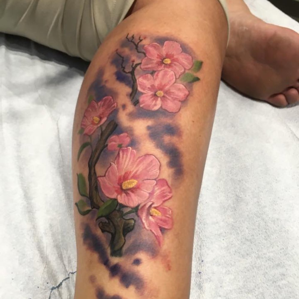 Revolt Tattoos - The wife's tattoo. This was a coverup of a small tat on the bottom part of the calf, but we never expected anything this great.  Incredible! - Tattoo Near Me - Las Vegas, Nevada