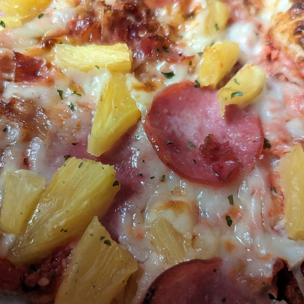 Roppolo's Pizzeria - Hawaiian pizza with ham, bacon, and pineapple - Pizza Near Me - Austin, Texas Roppolo's Pizzeria - Hawaiian pizza with ham, bacon, and pineapple - Pizza Near Me - Austin, Texas