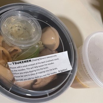Tomizo Ramen - a plastic container filled with food - Ramen Near Me - Gardena, California Tomizo Ramen - a plastic container filled with food - Ramen Near Me - Gardena, California