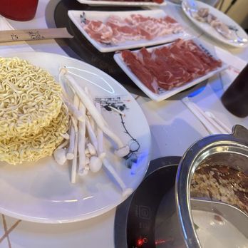 Ombu Hotpot & Korean BBQ - Assortment of meats and add-ins - Barbeque Near Me - Marrero, Louisiana