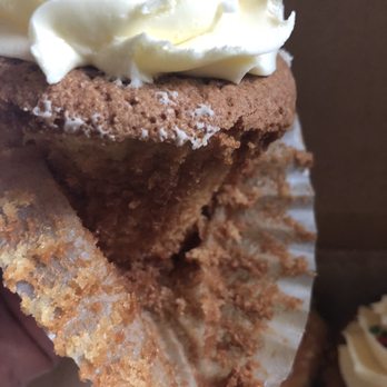 Cakes By Happy Eatery - This was supposed to be a vanilla cupcake. Notice the extra dark edges. It tasted even worse. - Bakeries Near Me - Manassas, Virginia