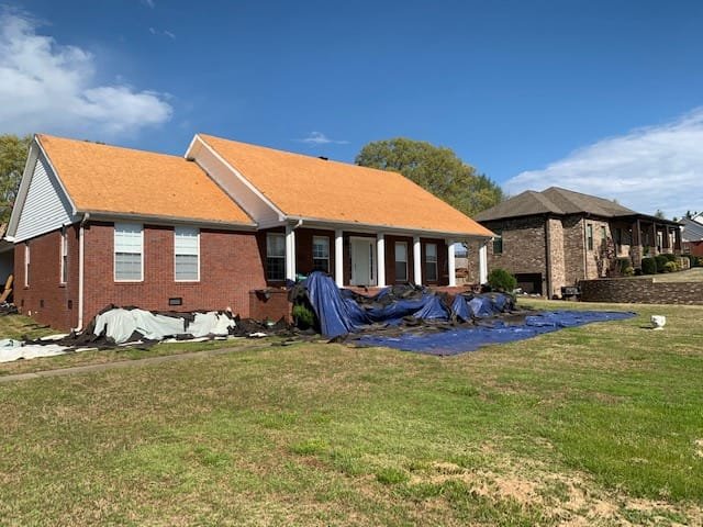 Slide of Tycon Roofing