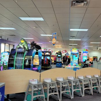 Chuck E. Cheese - a row of arcade machines - Pizza Near Me - Goodyear, Arizona Chuck E. Cheese - a row of arcade machines - Pizza Near Me - Goodyear, Arizona