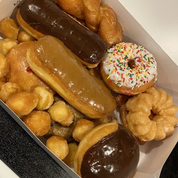 Helen's Donuts & Ice Cream - Mixed dozen, he throws in holes on top! - Donuts Near Me - Tacoma, Washington