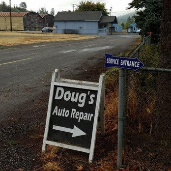 Doug's Auto Repair - Sign on Cobb Street with the post office in the background. - Auto Repair Near Me - Dillard, Oregon
