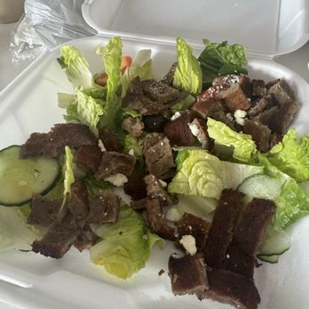 Papu’s Cafe - This is how the salad looked as soon as I opened it... like 5 pieces of lettuce and no red onion like the menu description said. - Middle Eastern Near Me - Kansas City, Missouri