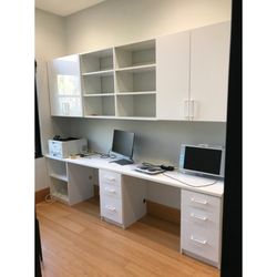 Closet Solutions - Home school, home office, or just stuck at home? Let us help you design the perfect work space like this dual office with high gloss doors.
