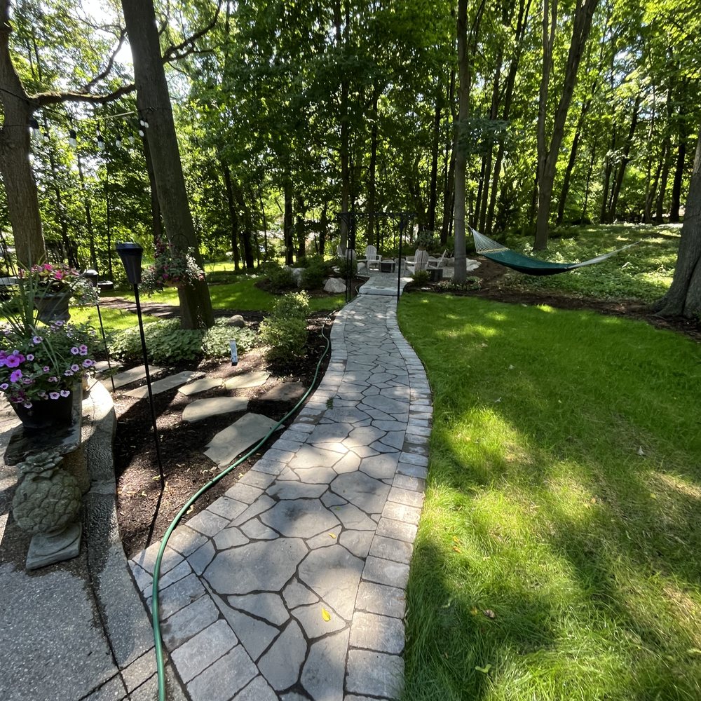 Sinacori Landscaping - a walkway in a park - Landscaping Near Me - Shelby Township, Michigan Sinacori Landscaping - a walkway in a park - Landscaping Near Me - Shelby Township, Michigan