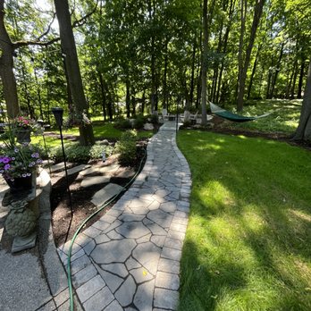 Sinacori Landscaping - a walkway in a park - Landscaping Near Me - Shelby Township, Michigan Sinacori Landscaping - a walkway in a park - Landscaping Near Me - Shelby Township, Michigan