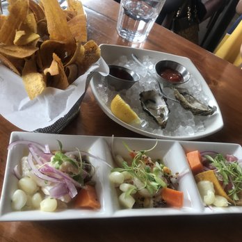 Puerto 27 Peruvian Kitchen & Pisco Bar - Oysters, ceviche sampler. - Peruvian Near Me - Pacifica, California Puerto 27 Peruvian Kitchen & Pisco Bar - Oysters, ceviche sampler. - Peruvian Near Me - Pacifica, California