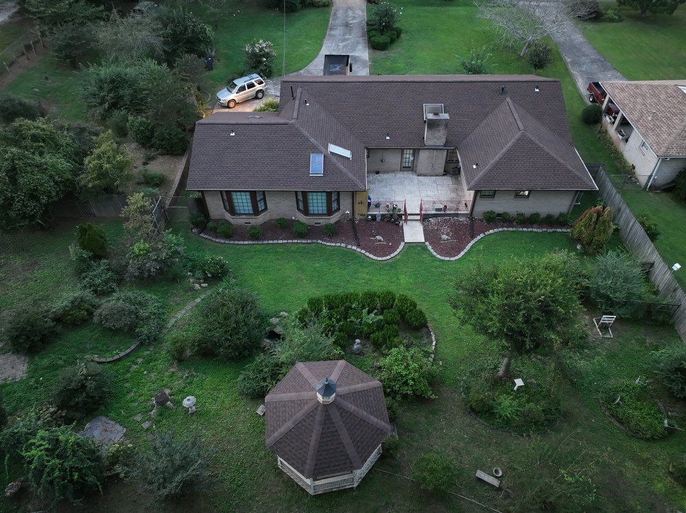 Slide of DOM Roofing & Restoration