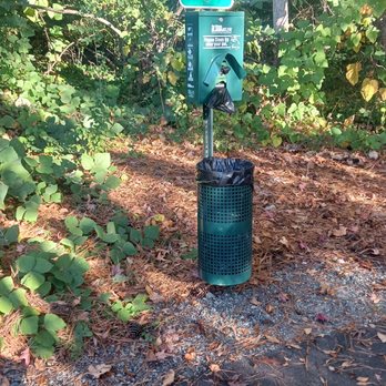 Rock Quarry Dog Park - A poop bag dispenser at the beginning of the pathway just in case - Dog Parks Near Me - Durham, North Carolina Rock Quarry Dog Park - A poop bag dispenser at the beginning of the pathway just in case - Dog Parks Near Me - Durham, North Carolina
