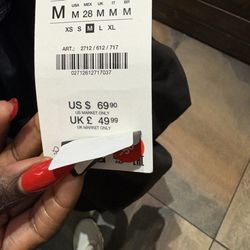 Zara - The original price of the clothing item and the advertised price for sale purposes.