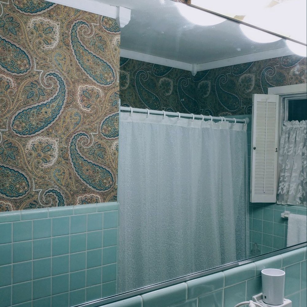 Update of a 1956 bathroom with paisley wallpaper