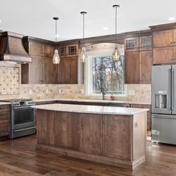 Century Carpet & Creative Floors - Granite countertops, custom backsplash, wide hardwood floors