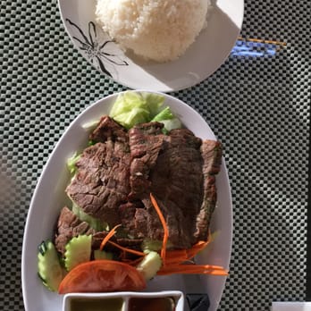 Bhan Baitong - Crying Tiger (Charbroiled Beef on a bed of Lettuce) with Sweet & Sour and Chile Lime Sauces and a Side of Rice! - Thai Near Me - Lake Forest, California