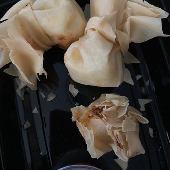 Sushi King Asian Fusion - 4 Pieces Seafood Rangoons up close - Sushi Bars Near Me - Columbus, Ohio Sushi King Asian Fusion - 4 Pieces Seafood Rangoons up close - Sushi Bars Near Me - Columbus, Ohio