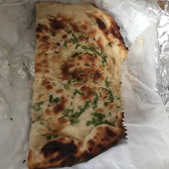 Tulsi - Nan with sprinkled garlic - Indian Near Me - Kittery, Maine Tulsi - Nan with sprinkled garlic - Indian Near Me - Kittery, Maine