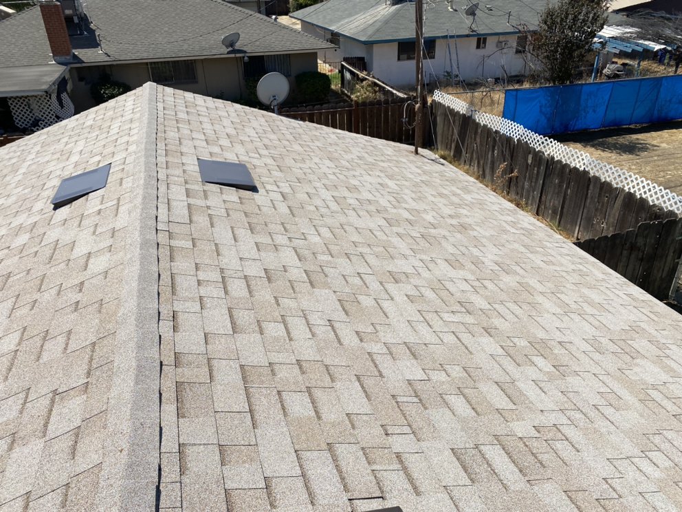 Slide of Modern Roofers and Restoration