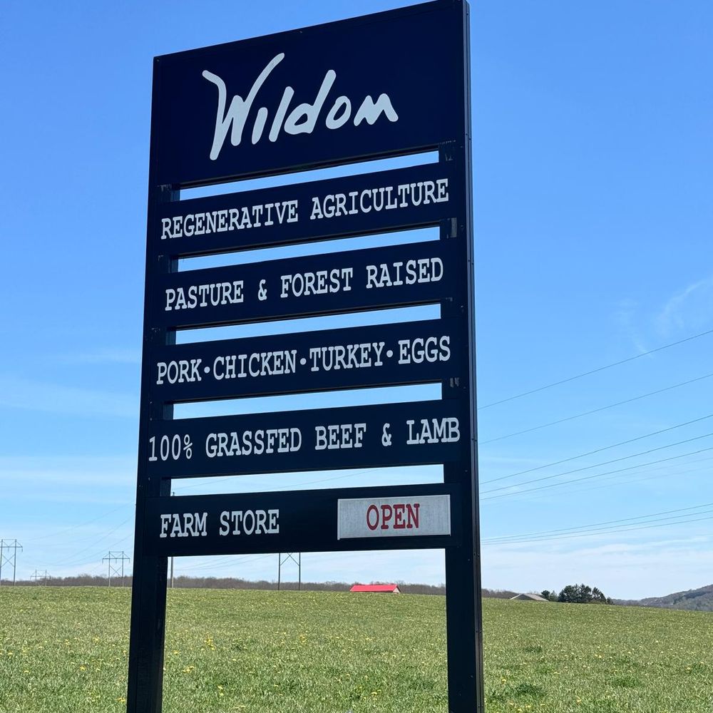 Wildom Farm - Wildom Farm sign out at by the road - Farms Near Me - McHenry, Maryland