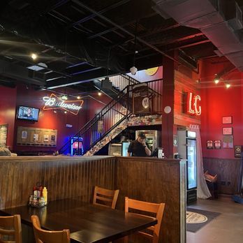 Lynnwood Grill & Brewing Concern - Steps to upstairs area on patio - Pizza Near Me - Raleigh, North Carolina Lynnwood Grill & Brewing Concern - Steps to upstairs area on patio - Pizza Near Me - Raleigh, North Carolina