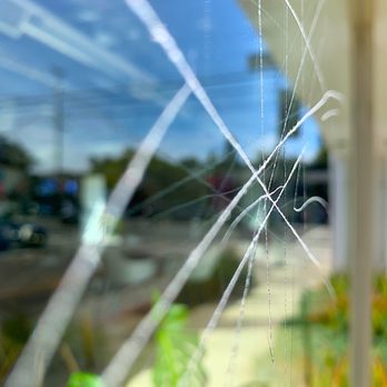 CC Surface Restoration - Deep graffiti scratched in glass. We can remove these all day. - Glass & Mirrors Near Me