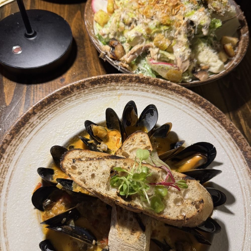 Mango Bay - Coconut Ginger Beer Mussels & Jerk Caesar Salad with Jerk Chicken - Caribbean Near Me - Brooklyn, New York Mango Bay - Coconut Ginger Beer Mussels & Jerk Caesar Salad with Jerk Chicken - Caribbean Near Me - Brooklyn, New York