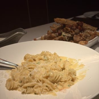 Vito's Chop House - Parmesan truffle fries and their signature Alfredo pasta - Italian Near Me - Orlando, Florida Vito's Chop House - Parmesan truffle fries and their signature Alfredo pasta - Italian Near Me - Orlando, Florida