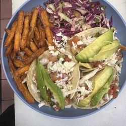 The Village Vibe Cafe - Fish tacos with a red cabbage and sweet potato