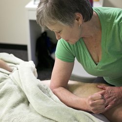 Pittsburgh Fitness Project - Massage therapist, Claudia Griffin, helping a client recover from a workout.