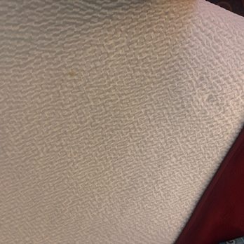 Blackstone Lodge & Suites - Stains on the bedding - Hotels Near Me - Lead, South Dakota