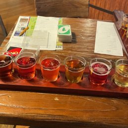 Flight including some ciders and some wines Flight including some ciders and some wines