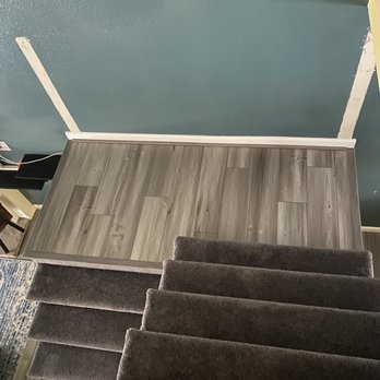 On Top Flooring - a staircase leading to a second floor - Flooring Near Me On Top Flooring - a staircase leading to a second floor - Flooring Near Me
