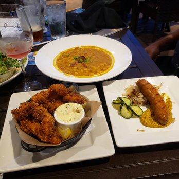 ROAM Kitchen + Bar - Corn chowder soup with healthy portion of chicken, Walleye Fingers, and hot link - New American Near Me - Sioux Falls, South Dakota ROAM Kitchen + Bar - Corn chowder soup with healthy portion of chicken, Walleye Fingers, and hot link - New American Near Me - Sioux Falls, South Dakota