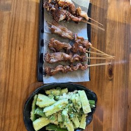 Smashed cucumber, meat skewers Smashed cucumber, meat skewers