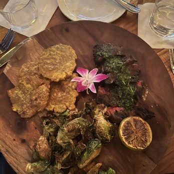 Saints + Council - Chimichurri skirt steak, with Tostones and brussels sprouts. - Breakfast & Brunch Near Me - Atlanta, Georgia Saints + Council - Chimichurri skirt steak, with Tostones and brussels sprouts. - Breakfast & Brunch Near Me - Atlanta, Georgia