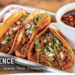 Three birria tacos and consomé is known as "The Experience" Three birria tacos and consomé is known as "The Experience"