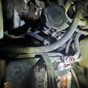 Sparky's Subaru Specialist - Plug wire that was not put back properly completely out of the tube causing misfire. - Auto Repair Near Me - Albuquerque, New Mexico Sparky's Subaru Specialist - Plug wire that was not put back properly completely out of the tube causing misfire. - Auto Repair Near Me - Albuquerque, New Mexico