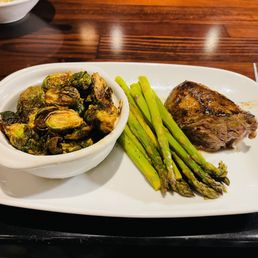 8oz Renegade Sirloin with asparagus and crispy brussel sprouts.