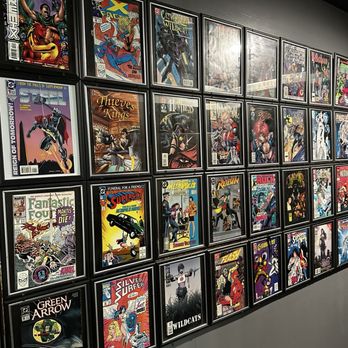 Wicks Park Bar & Grill - Wall of women's bathroom-framed comic books - Bars Near Me - Saugatuck, Michigan Wicks Park Bar & Grill - Wall of women's bathroom-framed comic books - Bars Near Me - Saugatuck, Michigan