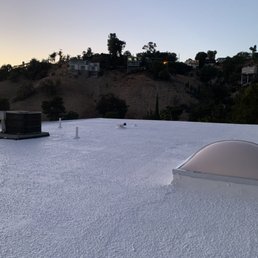 Silicone layer applied, new skylight sealed Silicone layer applied, new skylight sealed