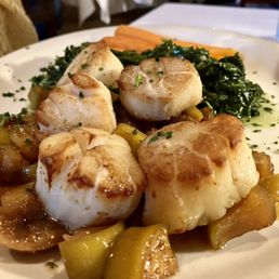 seared scallops over sun-dried fig, marsala, and caramelized apple