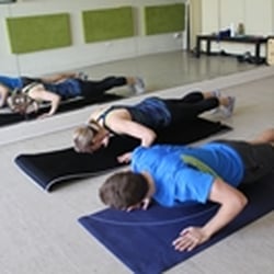 Personal Indulgence Fitness - Pushups at a fitness class