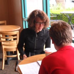 Working with a student at a local cafe