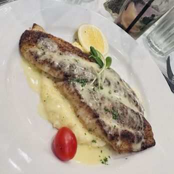 Mansurs on the Boulevard - Red fish on grits - Cajun/Creole Near Me - Baton Rouge, Louisiana