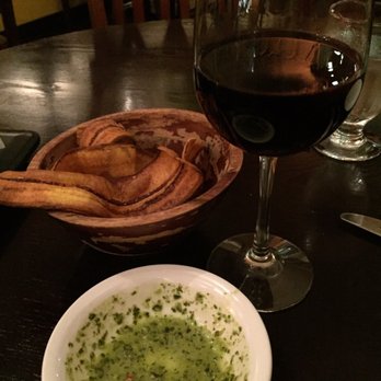 Longitud315 - Plantain chips, salsa and my glass of wine. All superb. - Latin American Near Me - Highwood, Illinois Longitud315 - Plantain chips, salsa and my glass of wine. All superb. - Latin American Near Me - Highwood, Illinois