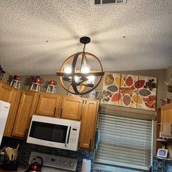 Karden Renovations - The 2 holes from the original lighting fixture. He did not feel it necessary to fill them in. I was not asking him to paint them. Seriously!