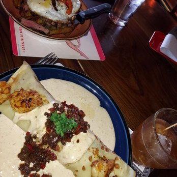 Carmella's Plates & Pints - Foreground: shrimp crepe. Background: steak and eggs. - Cocktail Bars Near Me - Pittsburgh, Pennsylvania Carmella's Plates & Pints - Foreground: shrimp crepe. Background: steak and eggs. - Cocktail Bars Near Me - Pittsburgh, Pennsylvania
