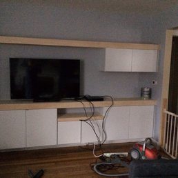 Paul installed cabinets and custom built the countertops using my design. They came out great-square, level and sturdy. Not quite done here.